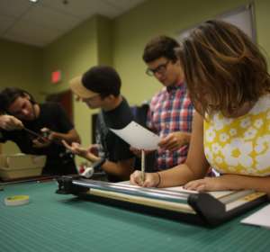 Students work in the studio area.